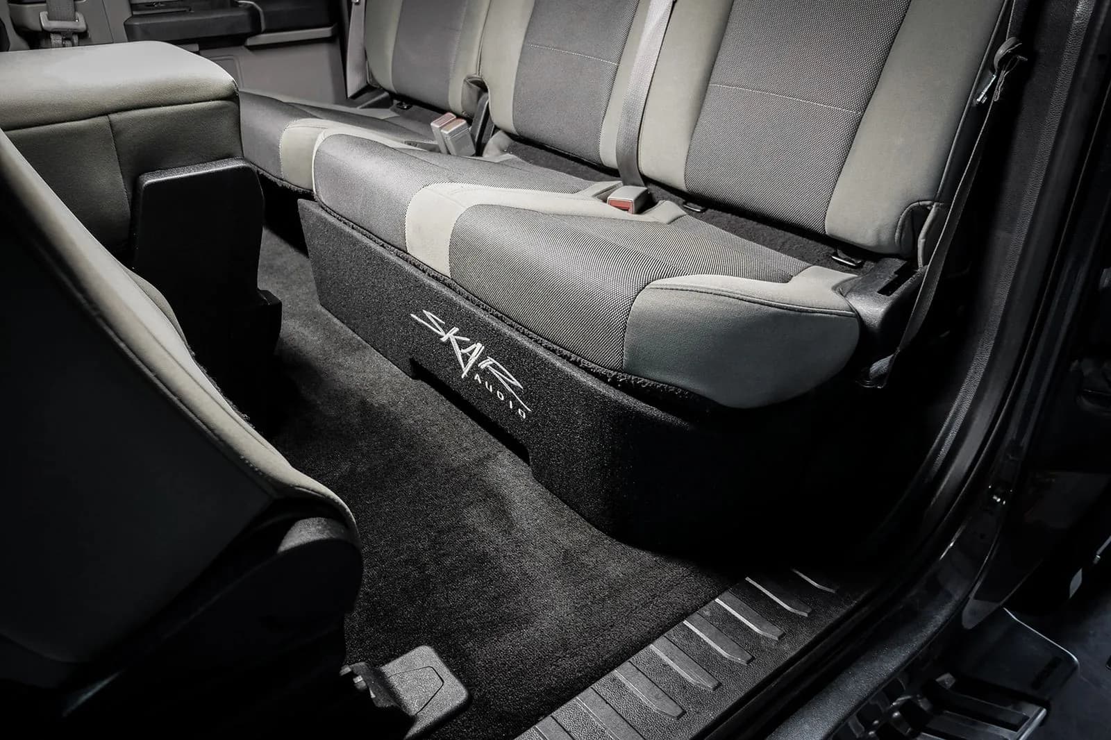 Skar Audio L-VD-VS-1X10FORD-2015-UP-SUPERCAB-V enclosure installation example — view 1
